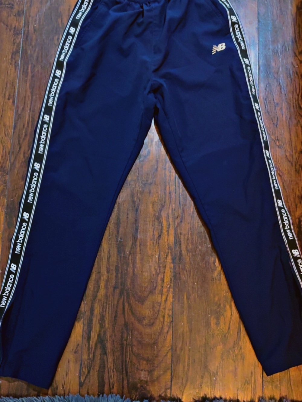 New Balance Navy Track Pants with Side Tape Logo and zip up bottom- size Medium